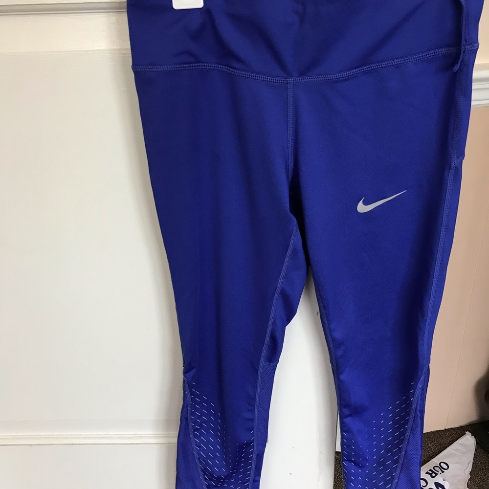 Electric blue Nike cropped running pants